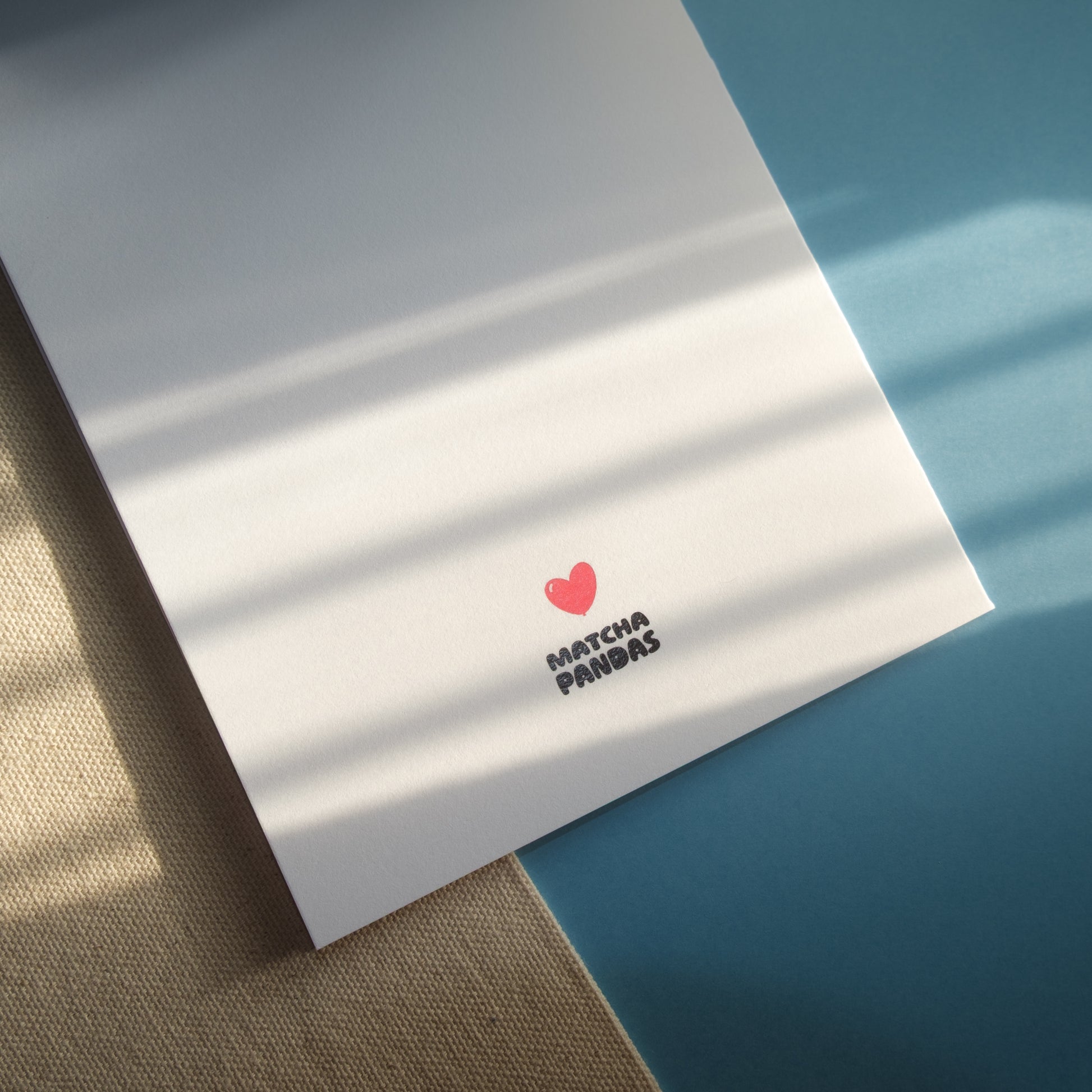 Back of You're the Beary Best Card - Matcha Pandas logo and red heart