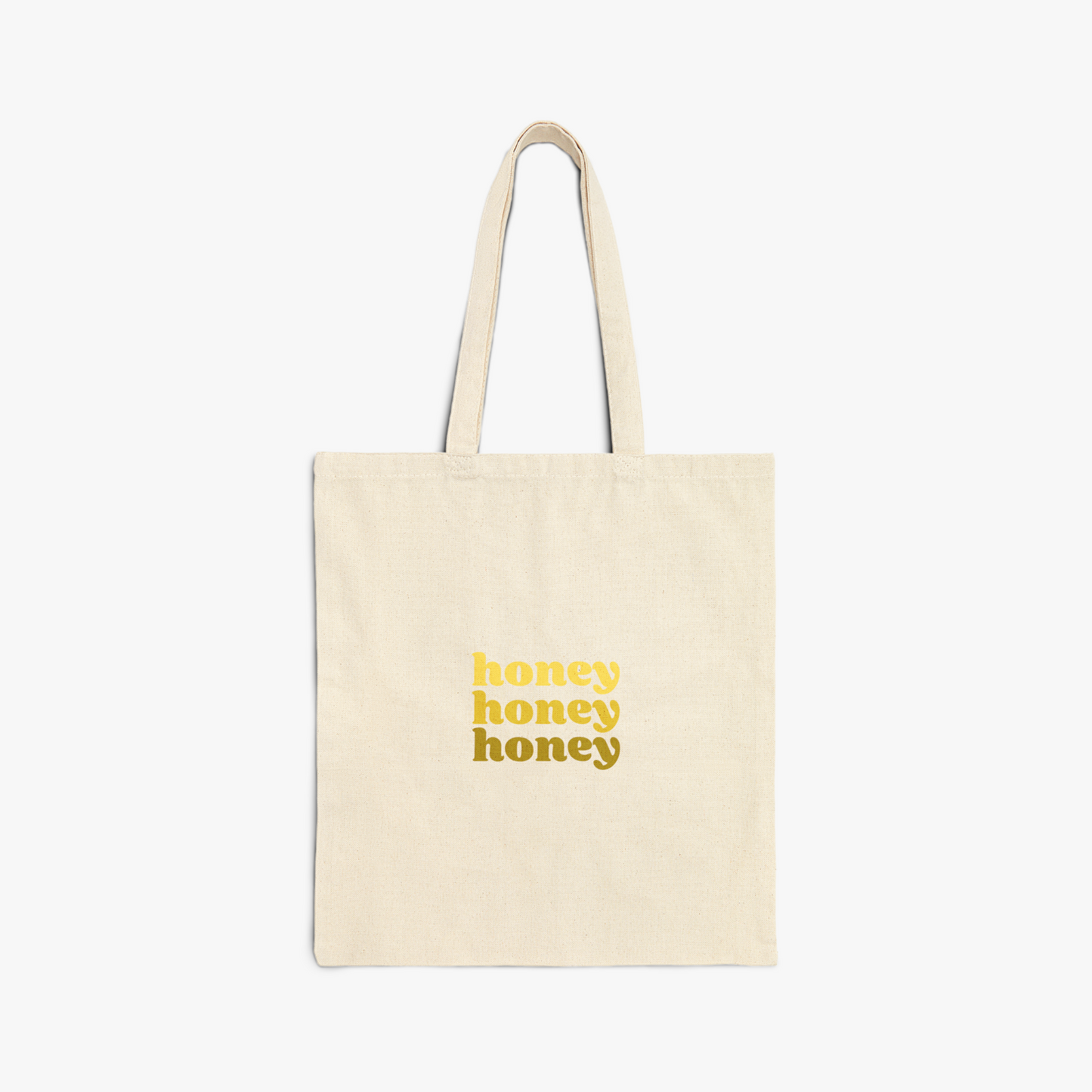 Tote bag with "honey" repeated text in yellow gradient