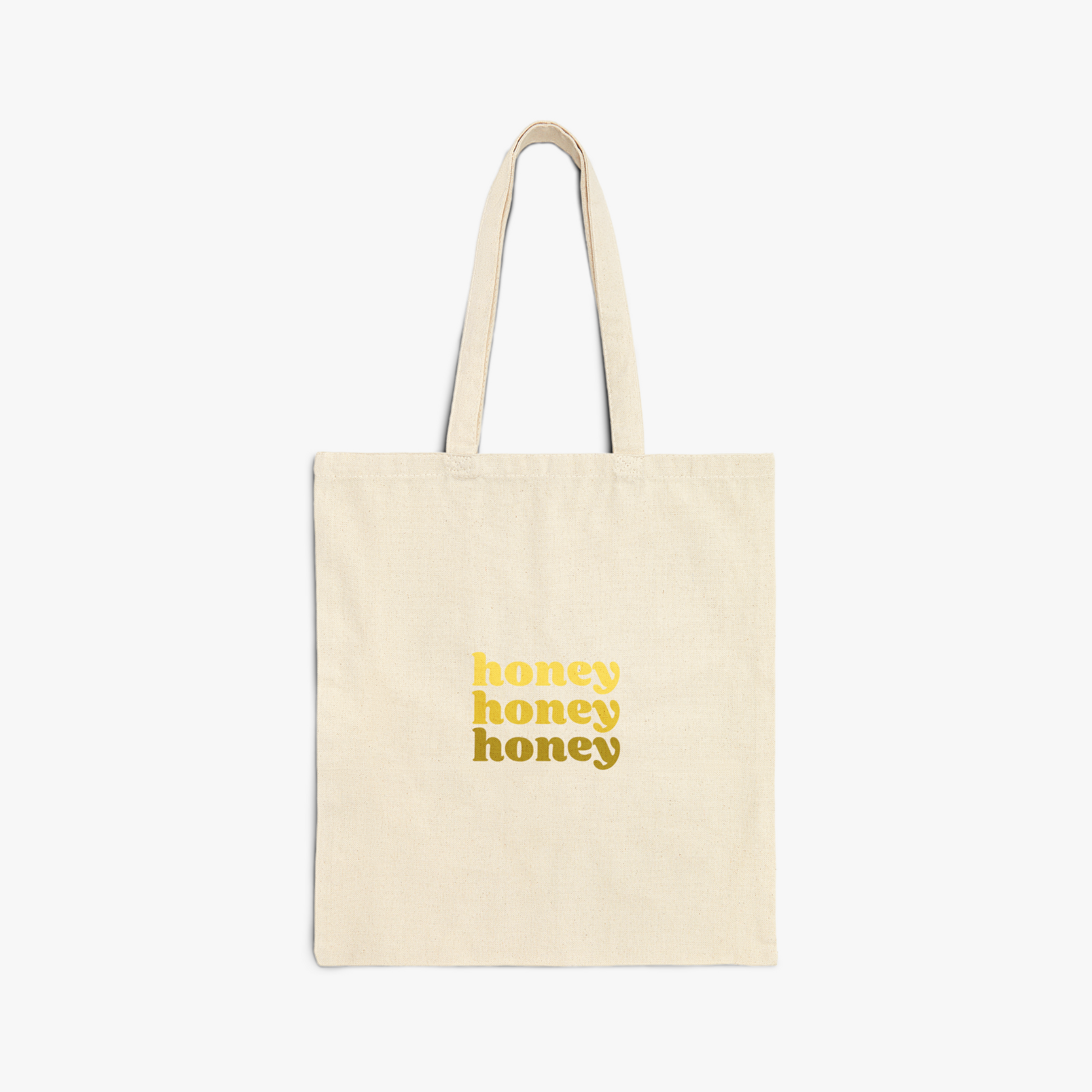 Tote bag with "honey" repeated text in yellow gradient