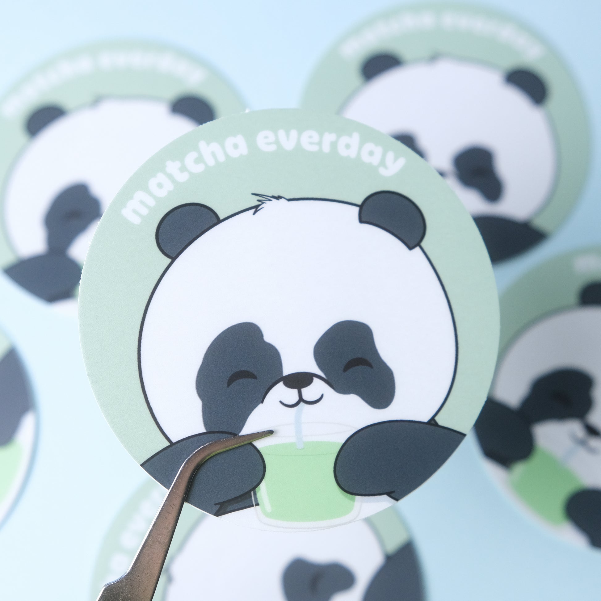 Round sticker of our cute panda drinking a glass of matcha with the phrase “matcha everyday”