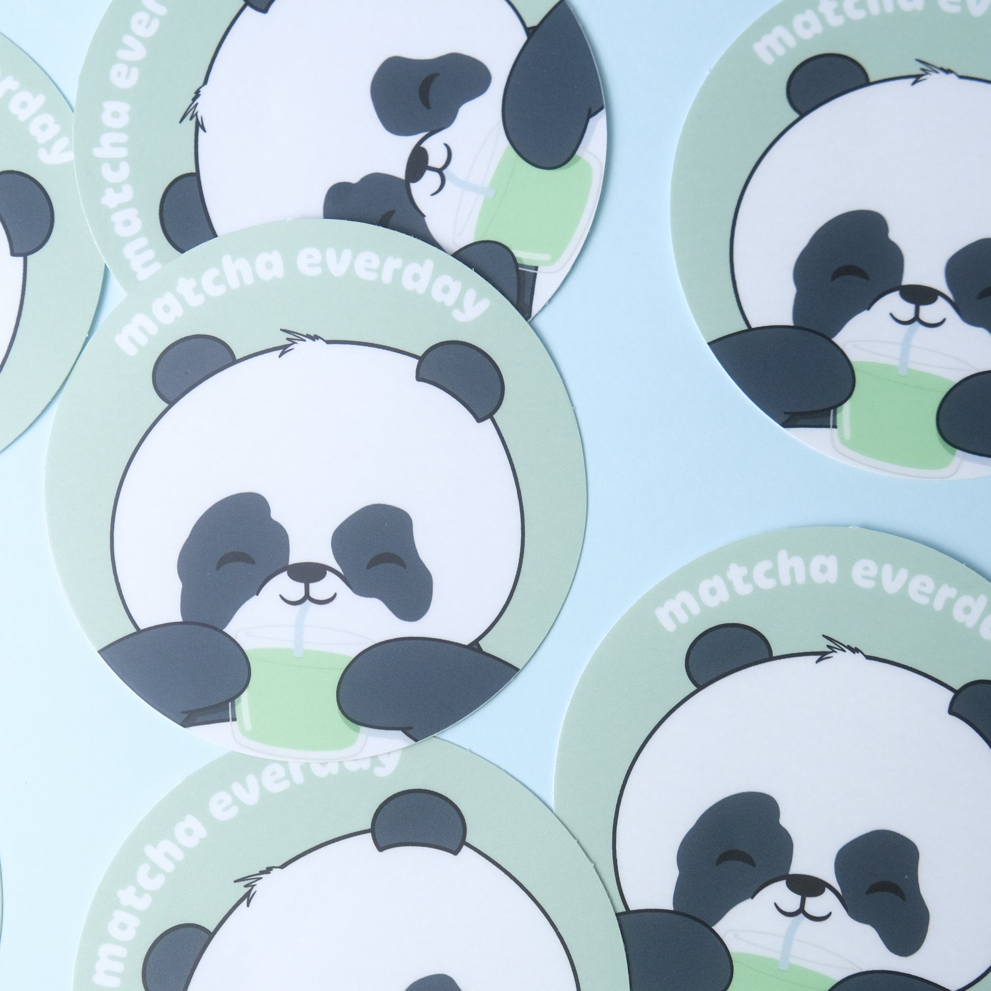 Round sticker of our cute panda drinking a glass of matcha with the phrase “matcha everyday”