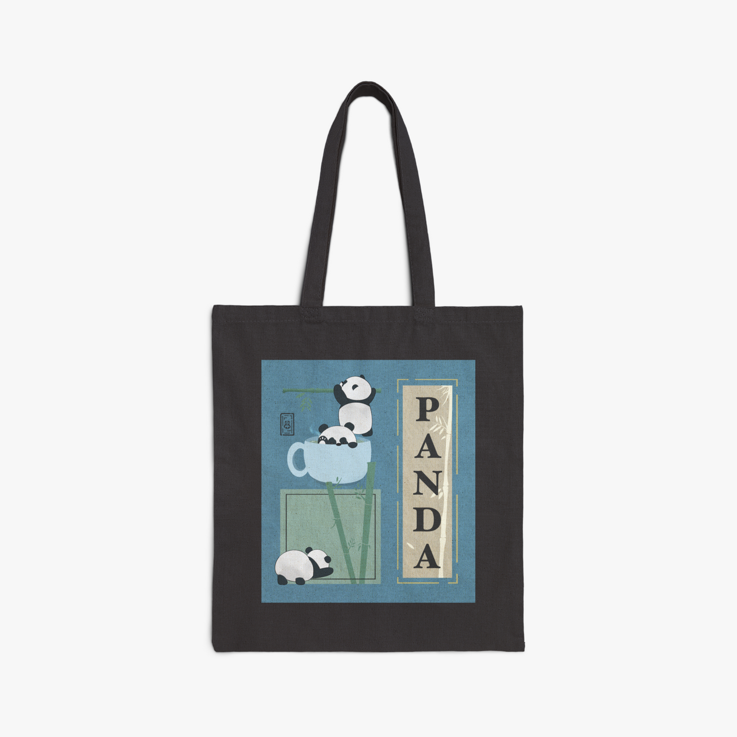 Black tote bag with panda graphic design - panda peeking out of coffee cup, panda hanging off bamboo, panda with bottom up in the air, large "PANDA" text, and various designs to add to the story