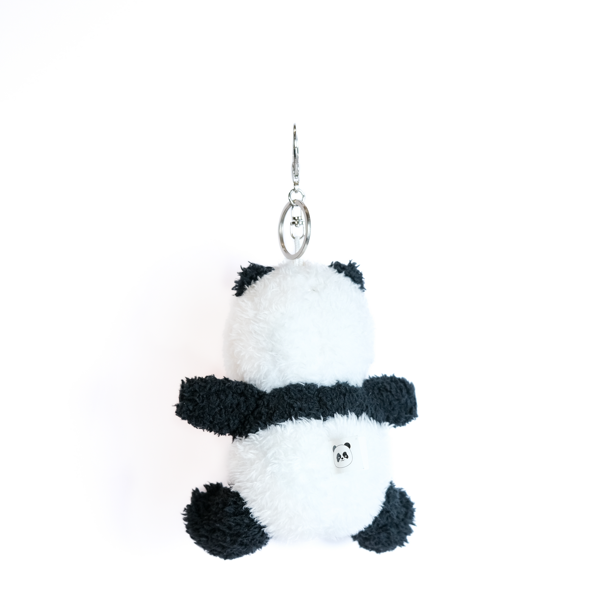 Back side view of panda plush keychain