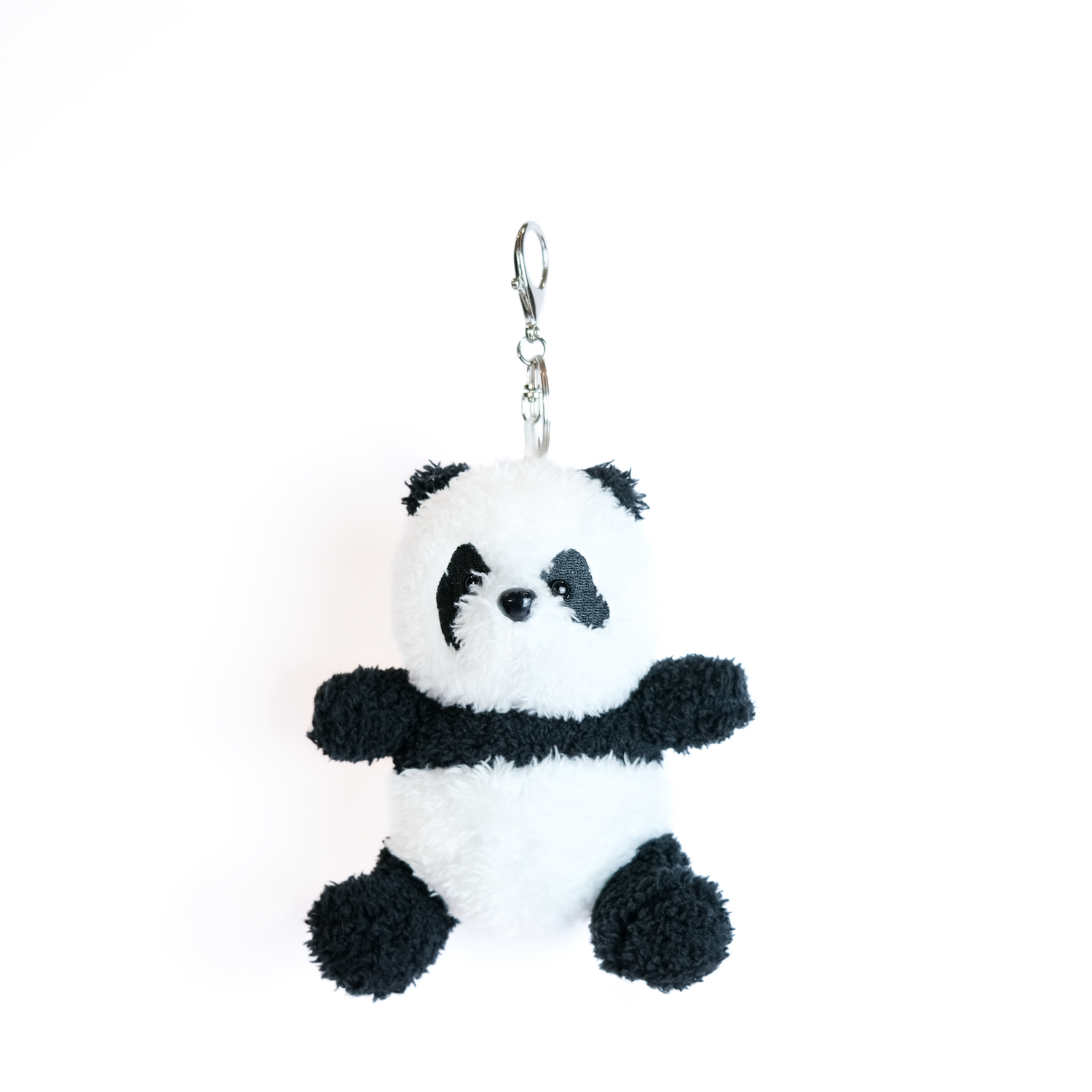 Front side view of panda plush keychain